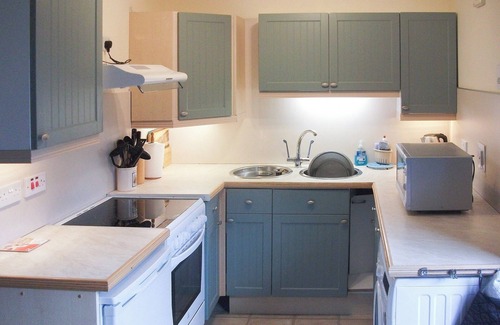 Drummore Cottage | Delightful cottage overlooking Luce Bay, with open fire and enclosed garden.