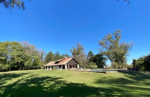 Partido de Ramallo Ski Chalet | Delightful Cottage Overlooking the Parana River.