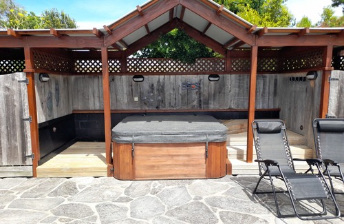 Tasman Cottage | Delightful sunny house with stunning rural & ocean views, swimming pool & spa