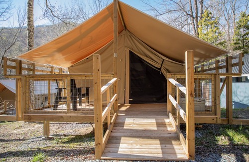 Saluda RV Rental | Deluxe Green River Glamping Tent in nature with wood burning oven!