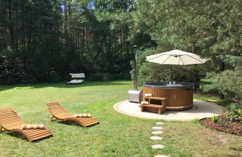 gmina Osieczna Villa | Deluxe Holiday Zdrojowa -Willa typu Alpejskiego w Borach Tucholskich-Całoroczna Balia z jacuzzi-Prywatny las i strumyk -Duża Wiata grillowa