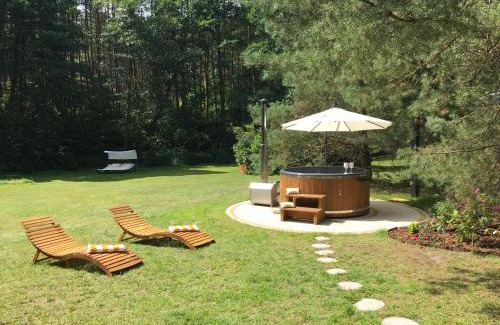 gmina Osieczna Villa | Deluxe Holiday Zdrojowa -Willa typu Alpejskiego w Borach Tucholskich-Całoroczna Balia z jacuzzi-Prywatny las i strumyk -Duża Wiata grillowa