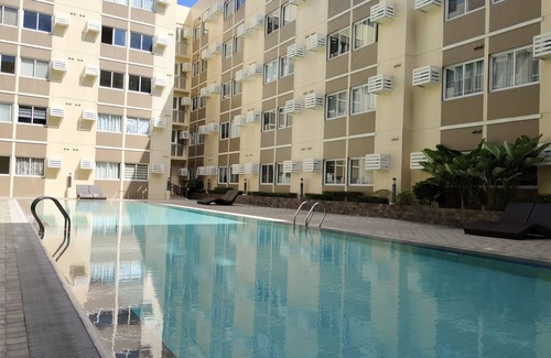 Binan City Condo | Deluxe Studio - Fast WiFi, 55" UHD TV with Netflix & Prime Video, Free Pool