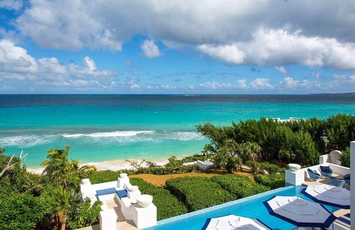 Long Bay Village Villa | Deluxe white 5 bedroom villa with sea view