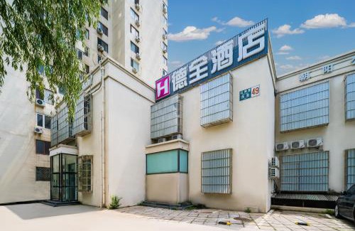 Middle Chaoyang Hotel | Dequan Hotel Chaoyang Park Branch Coffee fruits, snacks a gym and a laundry room are provided for free in the lobby