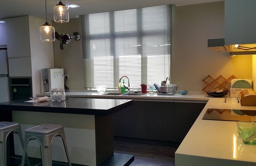 Klang Apartment | designer cozy spacious living hall and kitchen apartment
