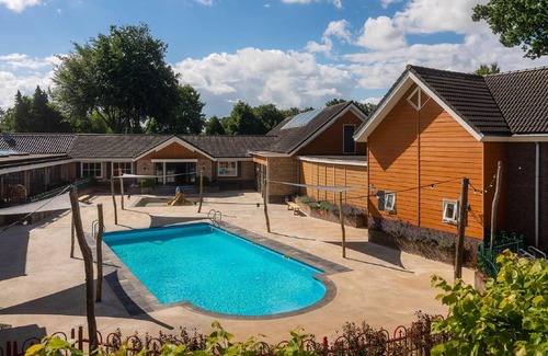 Municipality of Barneveld Villa | Detached Villa with Outdoor Fireplace near Veluwe