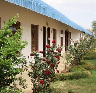 Maquassi Hills House | Die Geel Huis Guesthouse