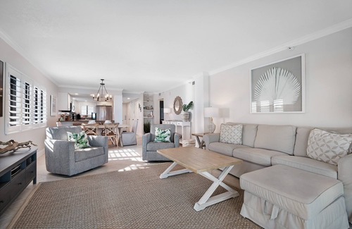 New Smyrna Beach Condo | Direct oceanfront corner condo with large wrap-around balcony and heated pool
