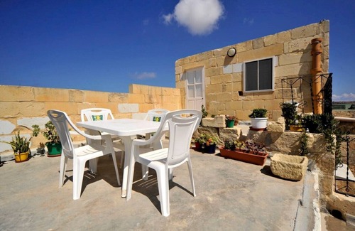 San Lawrenz House | Discover Tranquility: rustic elegance in this beautifully converted farmhouse.