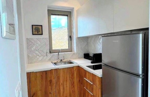 Koundouros Apartment | Discover Tzia Stone Studio where Modern Design meets Inspiring Sea Views
