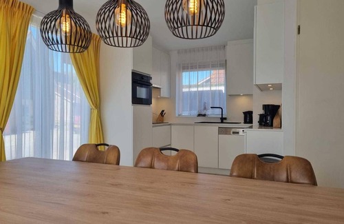 Breskens House | Do you want a pleasant holiday in an eco-friendly and energy-efficient home with all modern comforts . Features include : - Car charging station on private driveway so you don't have to move around .