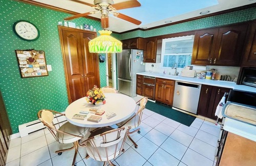 The Pines House | Dog-Friendly Beach Getaway with Koi Pond, Patio & Walkable to Town!