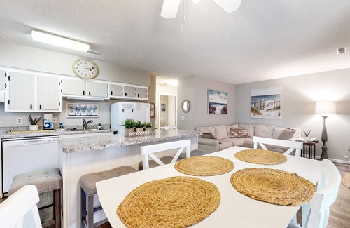Garden City Condo | Dog-friendly condo with ocean views, large deck, washer/dryer & central AC