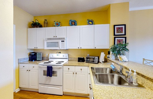 Frangista Beach Condo | Dog-friendly condo with pool, hot tub, private balcony, AC, & washer/dryer