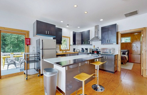 Brevard House | Dog-friendly downtown retreat with 2 kitchens & large fenced yards