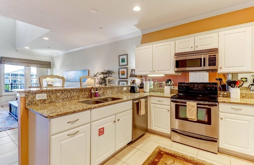Ocean Cay Condo | DOG FRIENDLY! Luxurious and professionally decorated townhome across street from beach.