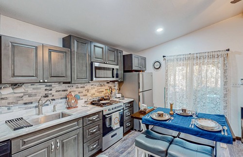 Mono Vista House | Dog-friendly lakefront cabin with canoes, athletic courts, grill, & horse stable