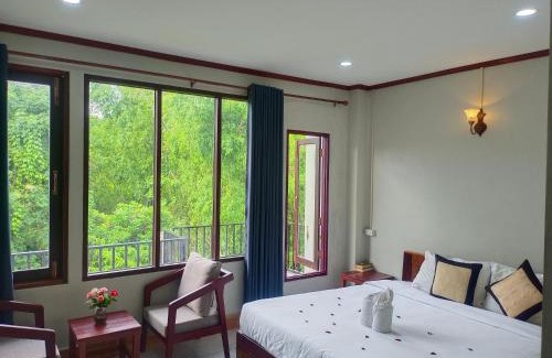 Vang Vieng Hotel | Dokchampa Hotel