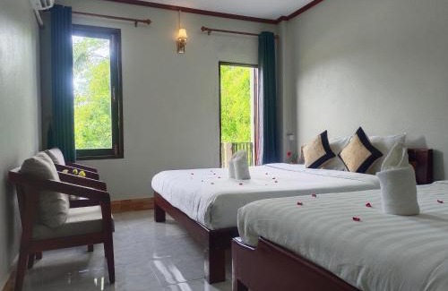 Vang Vieng Hotel | Dokchampa Hotel