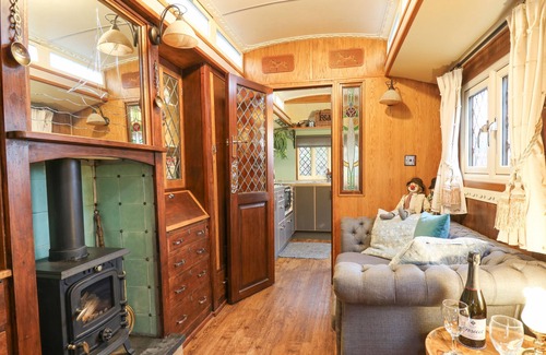 Tan-y-groes Cottage | DOLLY THE CIRCUS WAGON, pet friendly, with open fire in Brynhoffnant