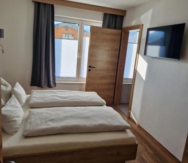 Alpendorf House | Doppelzimmer Deutschmann