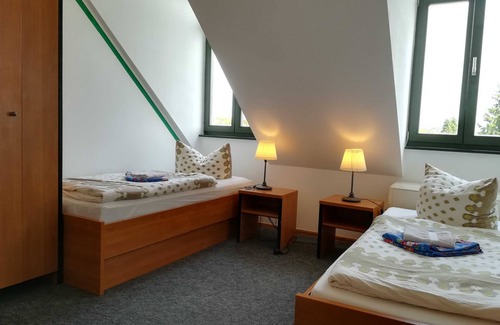Eggesin Bed & Breakfast | Double room (room 24) extra bed only with crib - Gästehaus EJS e.V.