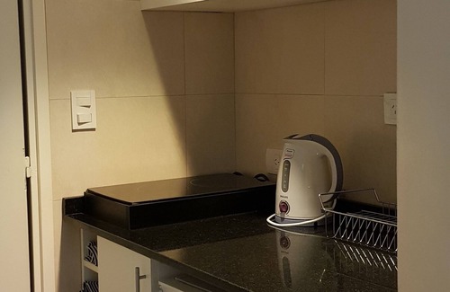 Retiro Apartment | Down Town Rest