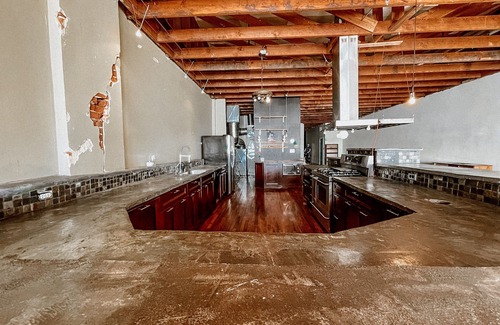 Enid House | Downtown loft apartment with excellent views, furnishings and location on square