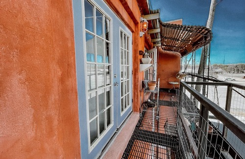 Enid House | Downtown loft apartment with excellent views, furnishings and location on square