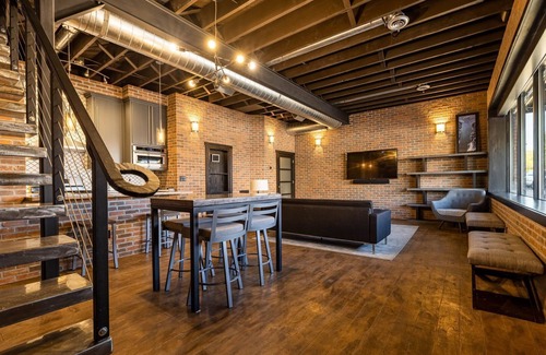 Cody House | Downtown Loft- industrial modern loft-style penthouse with rooftop deck!