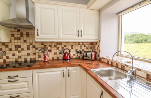 Glencar Cottage | DROMSTABLA, pet friendly in Glencar, County Kerry