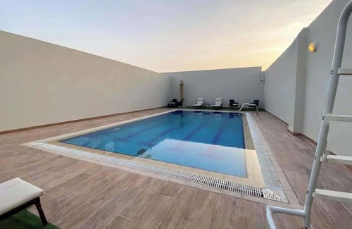 Dubai Apartment | Dubai South Studio for 2 with Swimming Pool!