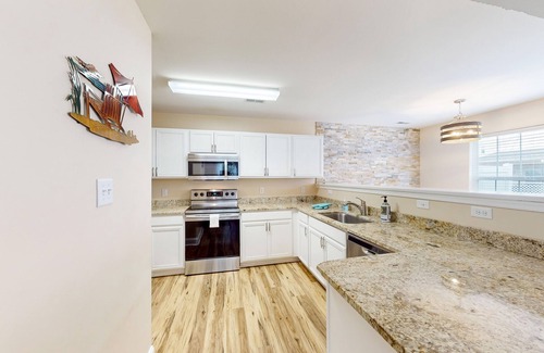 Keys Of Marsh Harbor House | Eagles Landing home with gas fireplace, washer/dryer, pool & tennis court