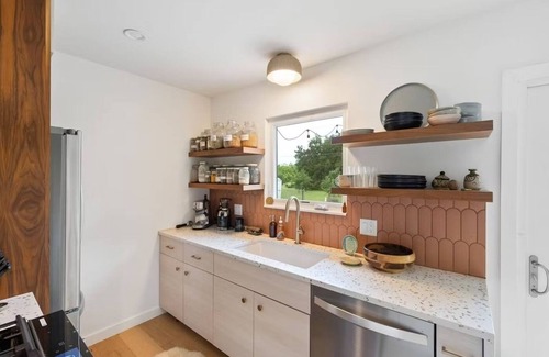 Foster Heights House | East Austin Contemporary w Natural Pool