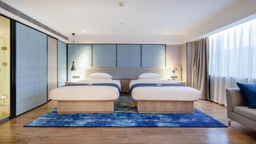 Hechi Hotel | Echarm Hotel Hechi Yizhou Municipal Center Plaza