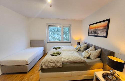 Meppen Apartment | EcoCube 142 - Balkon, 3Zimmer, Schlafsofa, Waschmaschine, Backofen, 6Pers