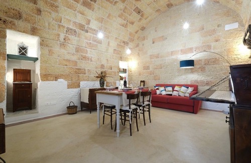 Corsano House | Elegance with exposed stone