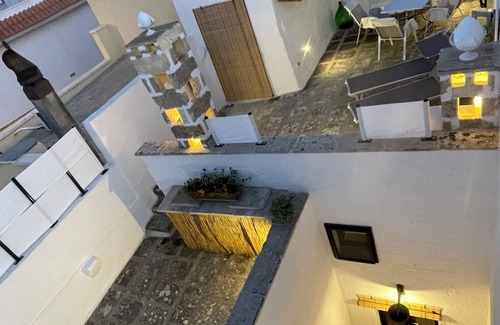 Corsano House | Elegance with exposed stone