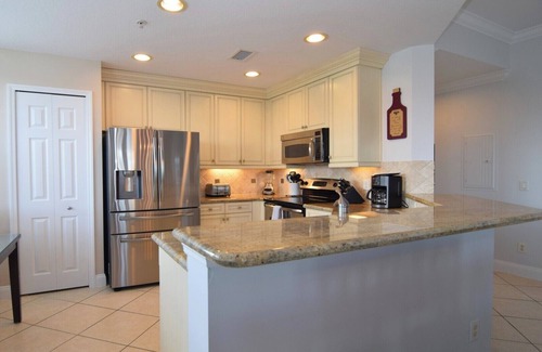 Reunion Condo | Elegant 3 bed/2 bath Top Floor Condo, Wraparound Balcony, Disney 7 miles!