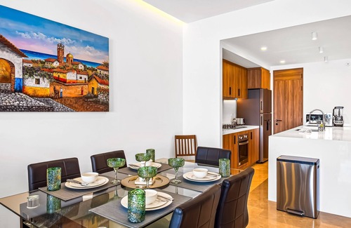 Las Glorias Condo | Elegant beachfront condo with stunning ocean views, heated pools & gym access