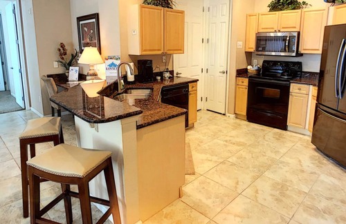 Loughman Condo | Elegant Condo w/Pool View Balcony Resort Pool & Gym. Near Disney/Shops