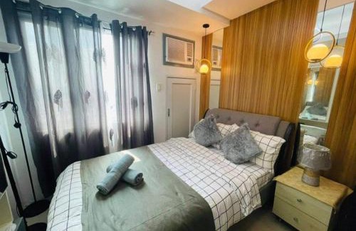 Santo Cristo Apartment | Elegant Condotel at Grass Residence