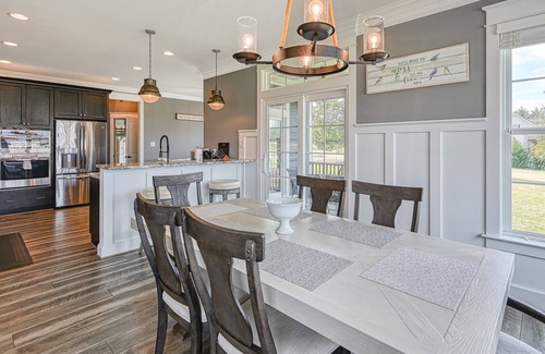Livingston House | Elegant lakefront home with water access, hot tub, dock, rec room & fireplaces