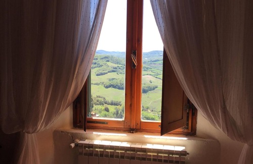 Radicondoli Apartment | Elegant, large duplex with renaissance details in charming village