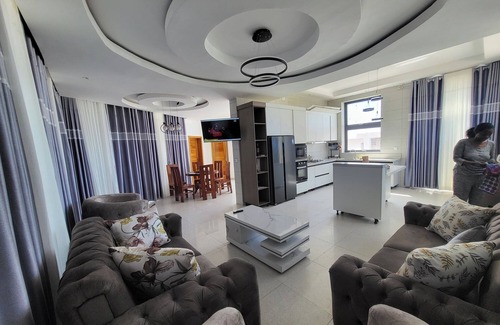 Kigali House | Elegant new 5-bedroom home with stunning rooftop and views in enchanting Kigali