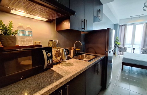 Ugong Apartment | ELUDE Designer Suite Pasig (Prime location)