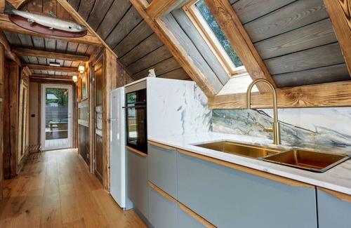 Blaskogabyggd Cabin | Embrace Nature by the River: Hot Tub & Spa Nearby!