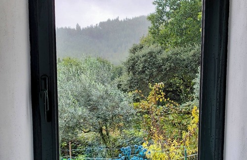 Castanheira de Pera Apartment | Enchanting converted wine cellar with panoramic views of the surrounding hills.