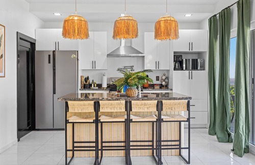 Pristine Bay House | Endless Island Horizons @ Coral Views, French Harbor